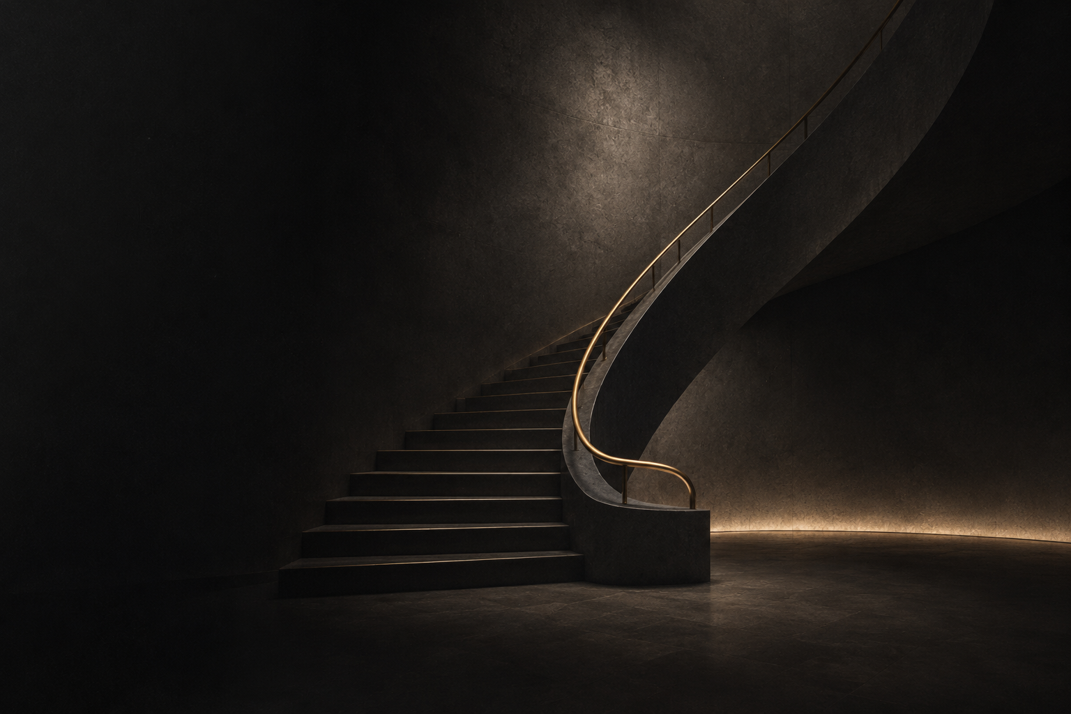Dark curved architectural staircase with a brass rail